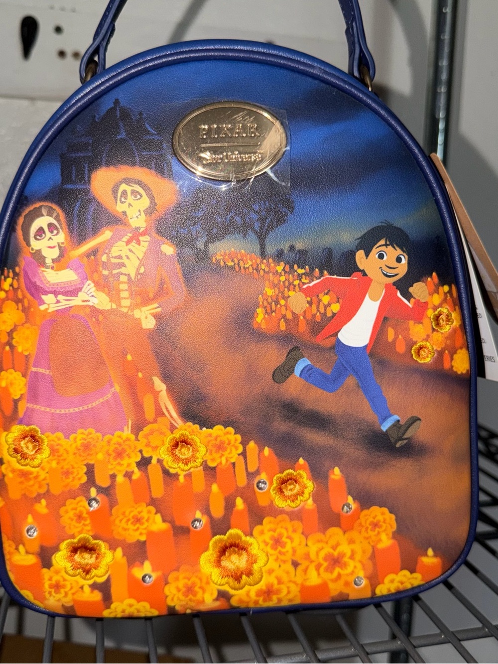 Loungefly Blue Coco Marigold Scene Mini Backpack